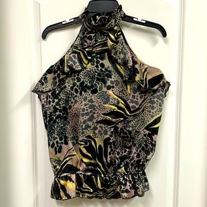 Uniquely shaped, lightweight top